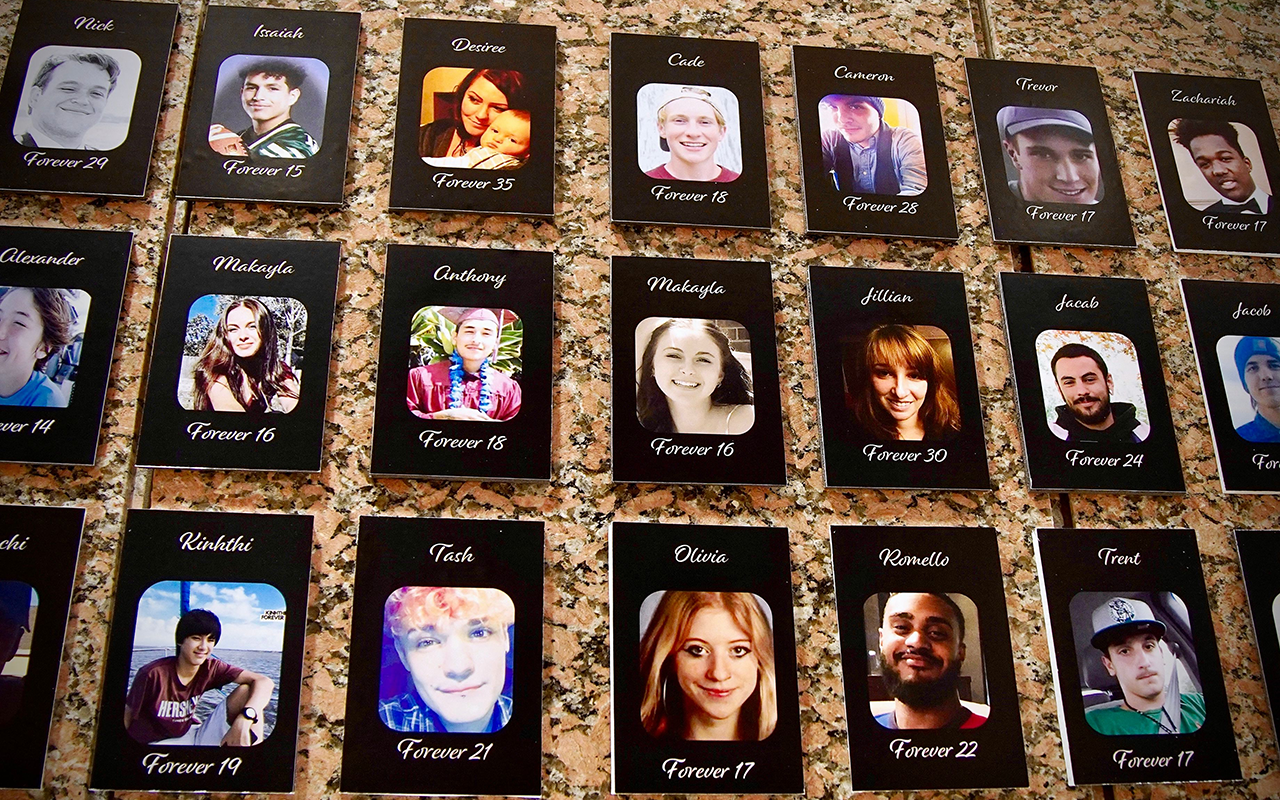 A photo of Makayla Cox, who died of a fentanyl overdose at age 16, is displayed among other portraits on "The Faces of Fentanyl" wall, which displays photos of Americans who died from a fentanyl overdose, at the Drug Enforcement Administration (DEA) headquarters in Arlington, Virginia, on July 13, 2022. - America's opioid crisis has reached catastrophic proportions, with over 80,000 people dying of opioid overdoses last year, most of them due to illicit synthetics such as fentanyl -- more than seven times the number a decade ago. "This is the most dangerous epidemic that weve seen," said Ray Donovan, chief of operations at the US Drug Enforcement Agency (DEA). "Fentanyl is not like any other illicit narcotic, its that deadly instantaneously."