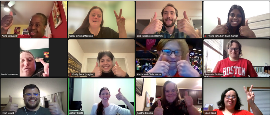 Members of the co-research team smile and give a thumbs up to the camera during a recent Zoom meeting.