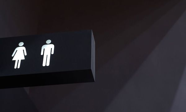 Public restroom signs for men and women