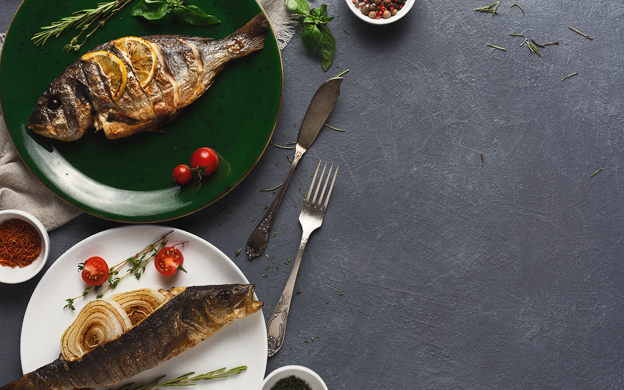 Whole fish on plates