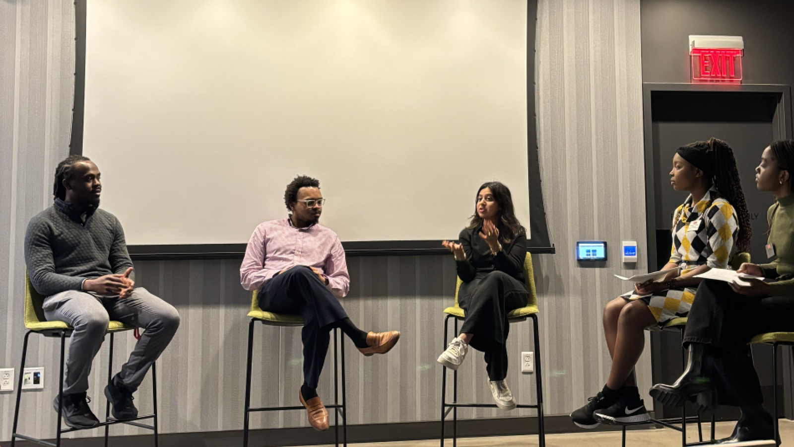 panelists at event discussing code-switching at work