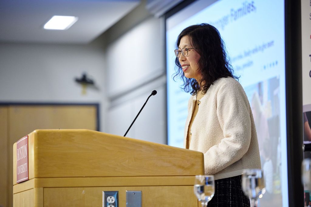 female professor at podium