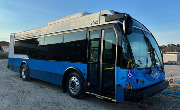 Hyatt blue-silver bus