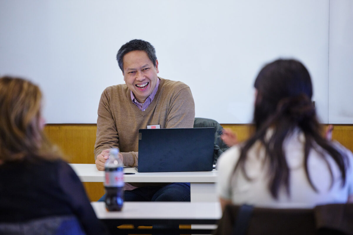 Bobby Hiep Bui smiling at students in class