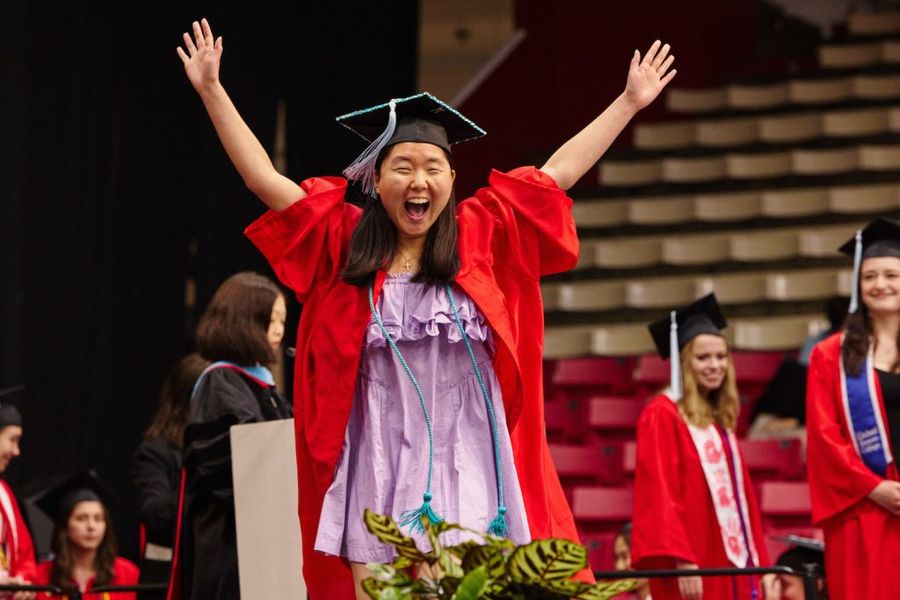 Shows student celebrating at Convocation