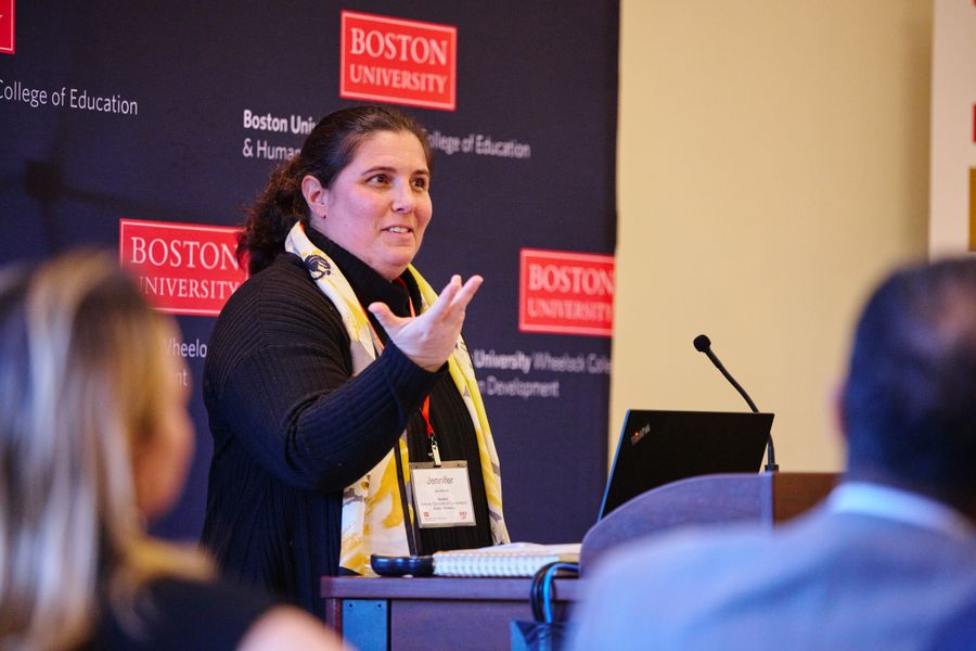 Jennifer Bill speaking at a podium