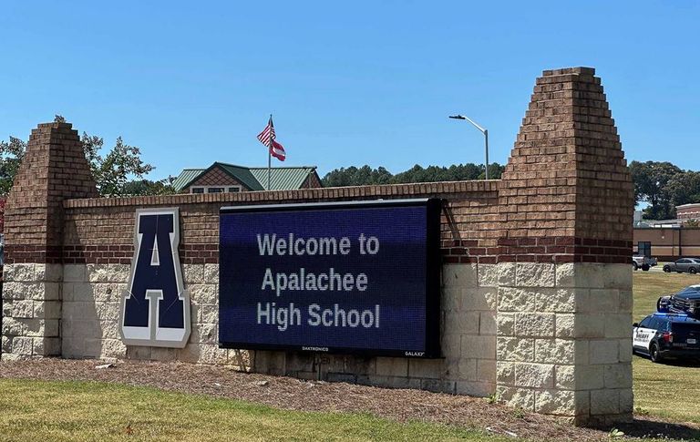 Shows the sign that says Welcome to Apalachee High School