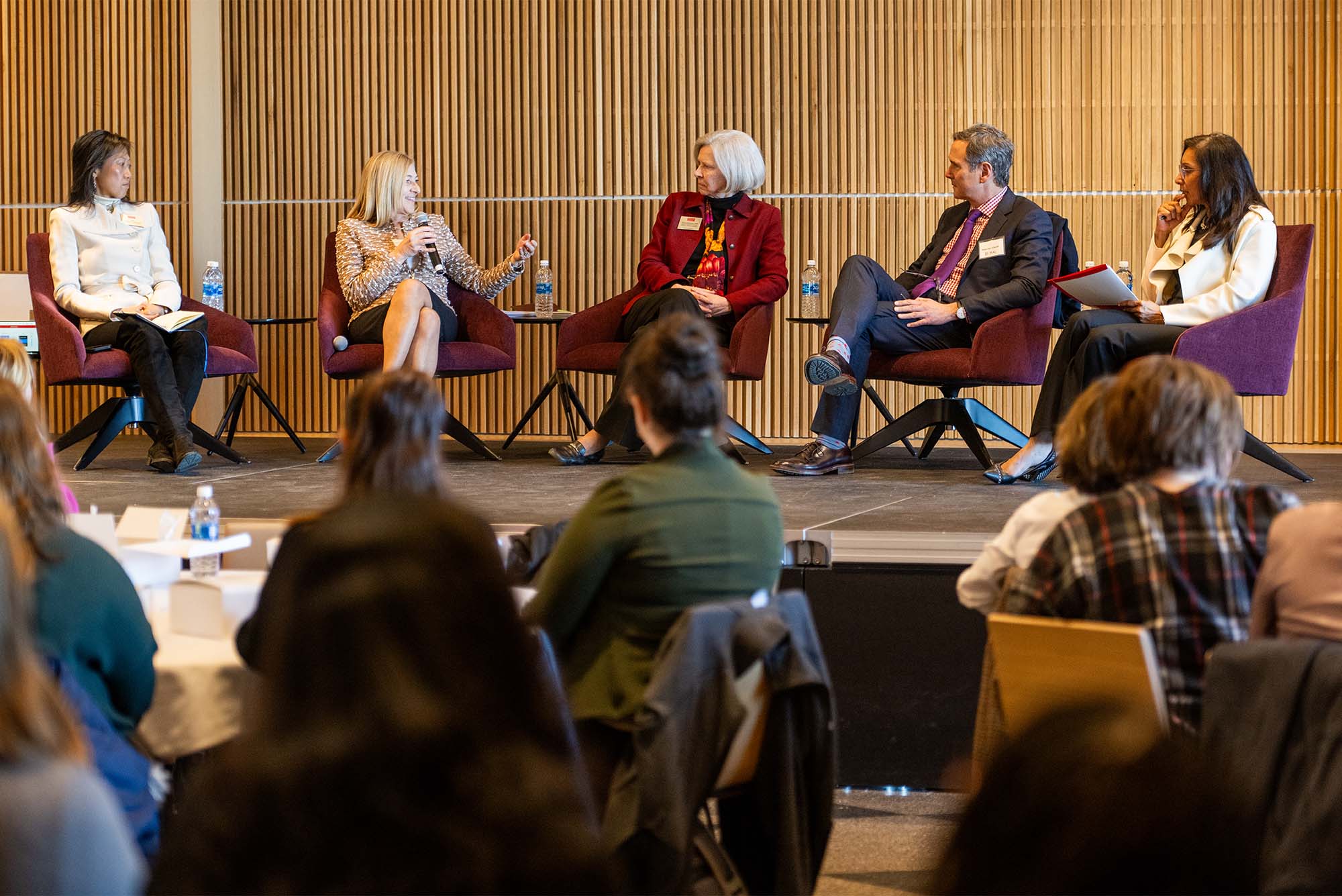 Photo: A panel of experts debate gender pay equity at a recent conference at Boston University.